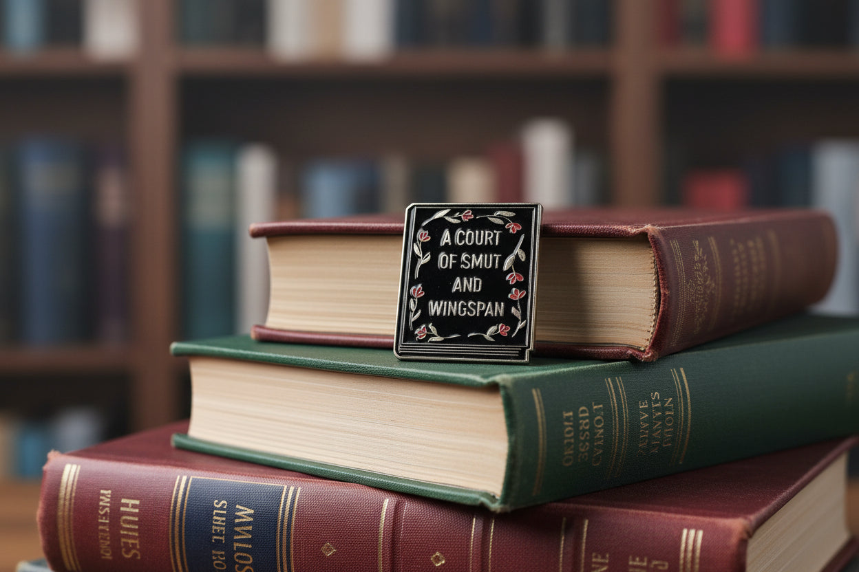 Stack of books with a small sign on top in a library setting