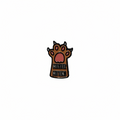 Small enamel pin with a paw design and text on a white background