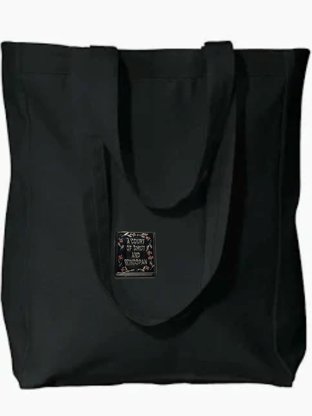 Black tote bag with a small label on a white background