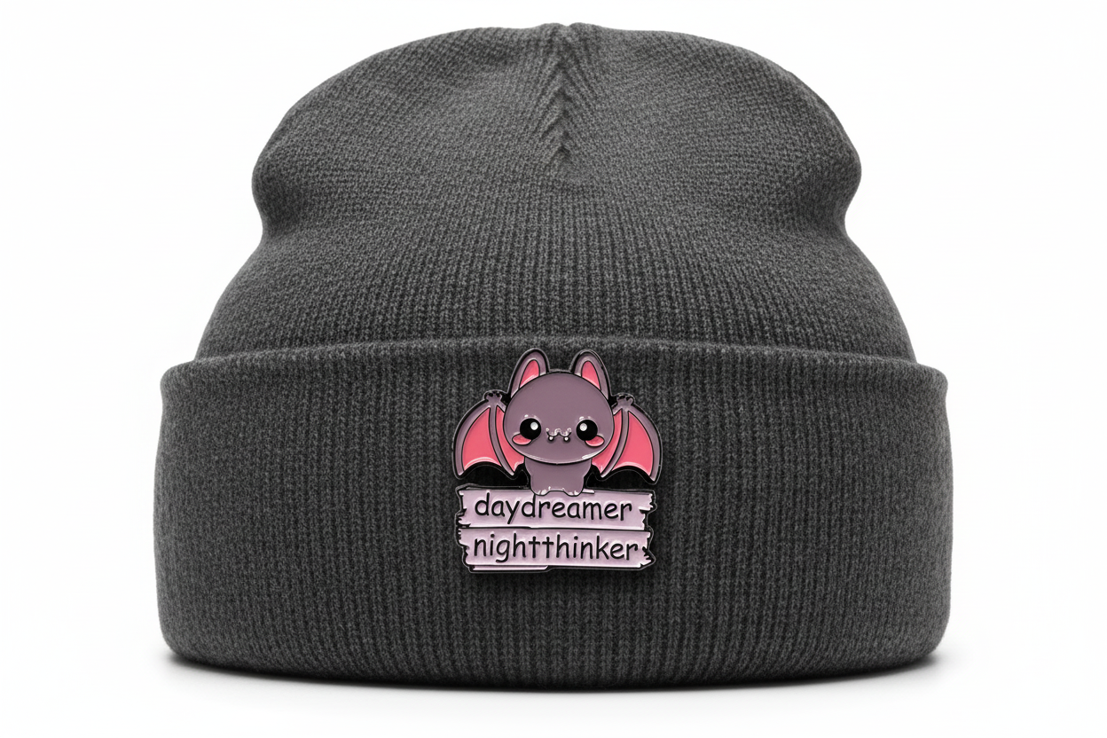 day dreamer night thinker enamel pin worn on beanie hat witchy enamel pin for casual outfits and street wear