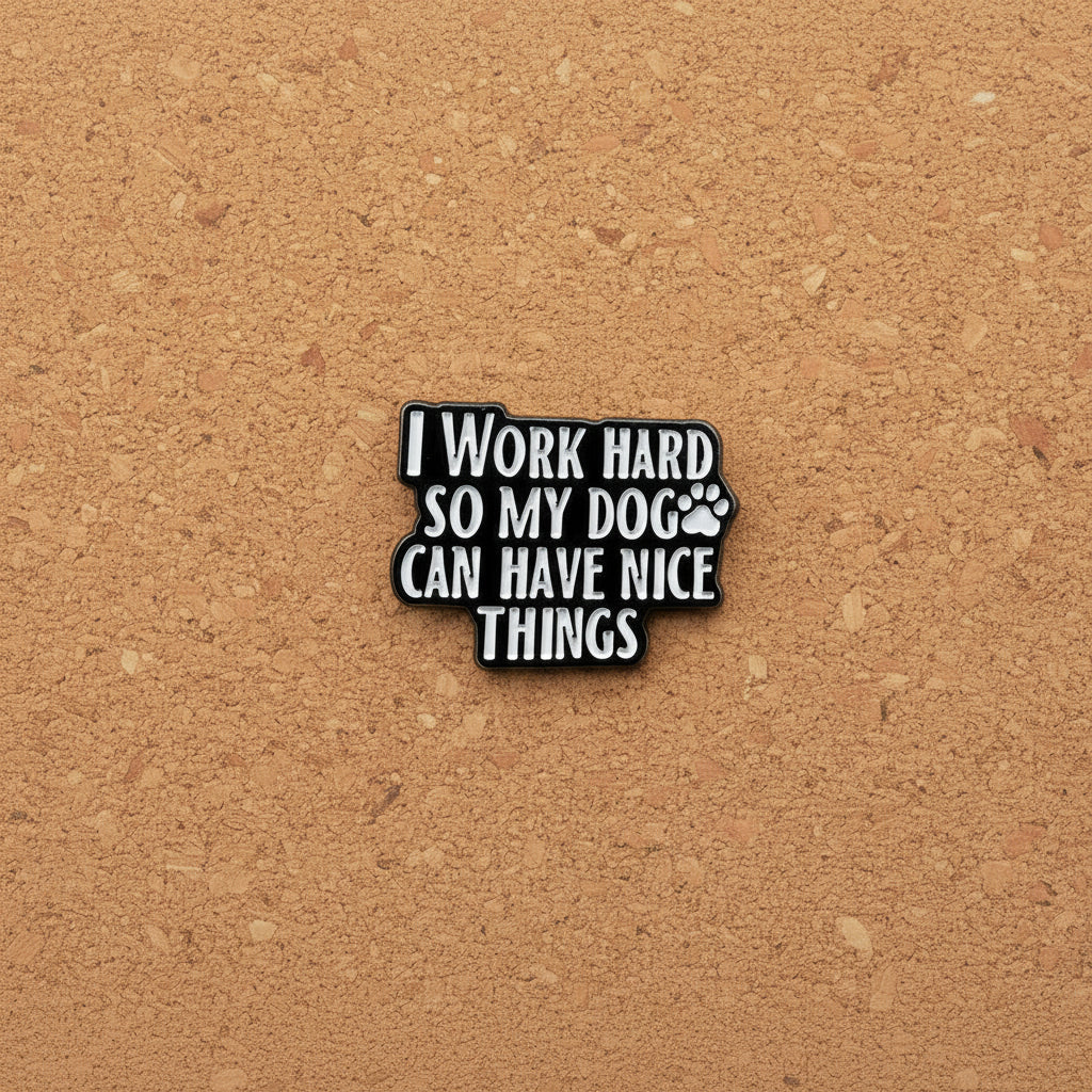 I work hard so my dog can have nice things enamel pin displayed on cork board gen z enamel pin for collectors and display