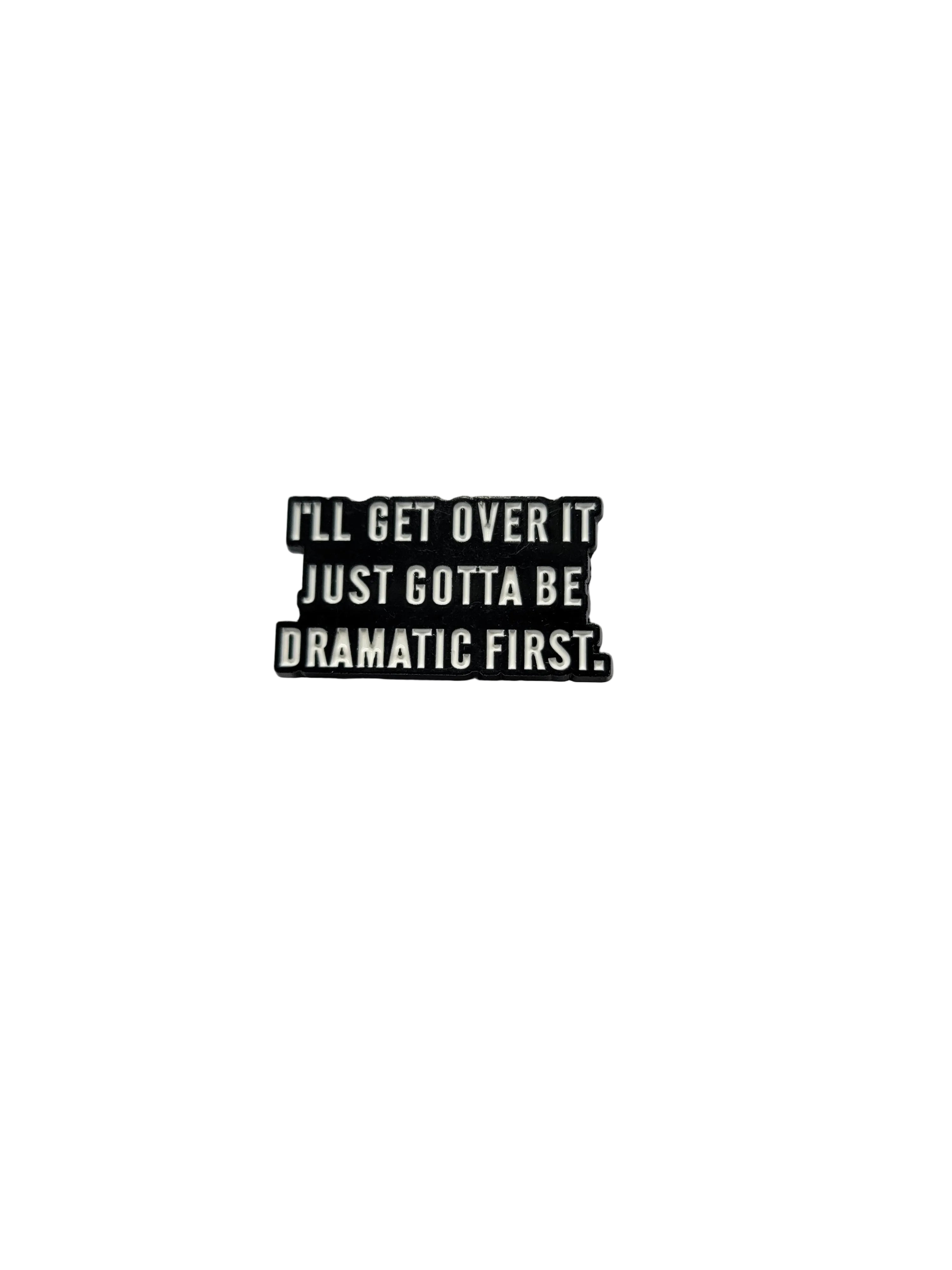 Black rectangular sign with white text on a gray background