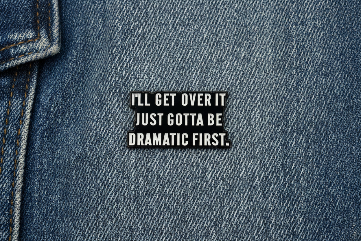 Black rectangular sign with white text on a denim background