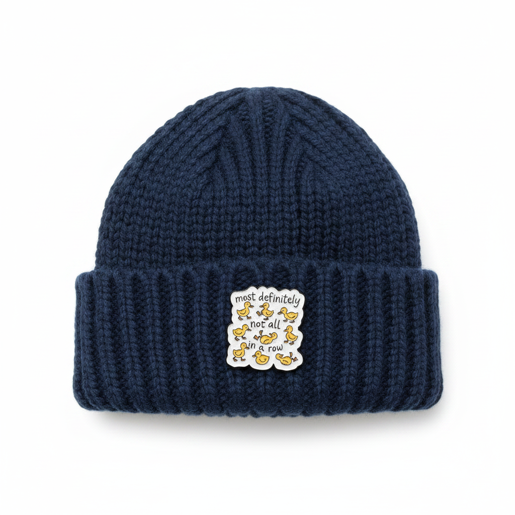 Most definitely not all in a row enamel pin worn on beanie hat alternative enamel pin for casual outfits and street wear