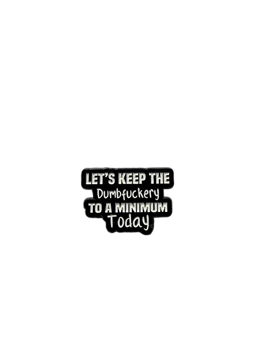 Black and white enamel pin with text on a gray background