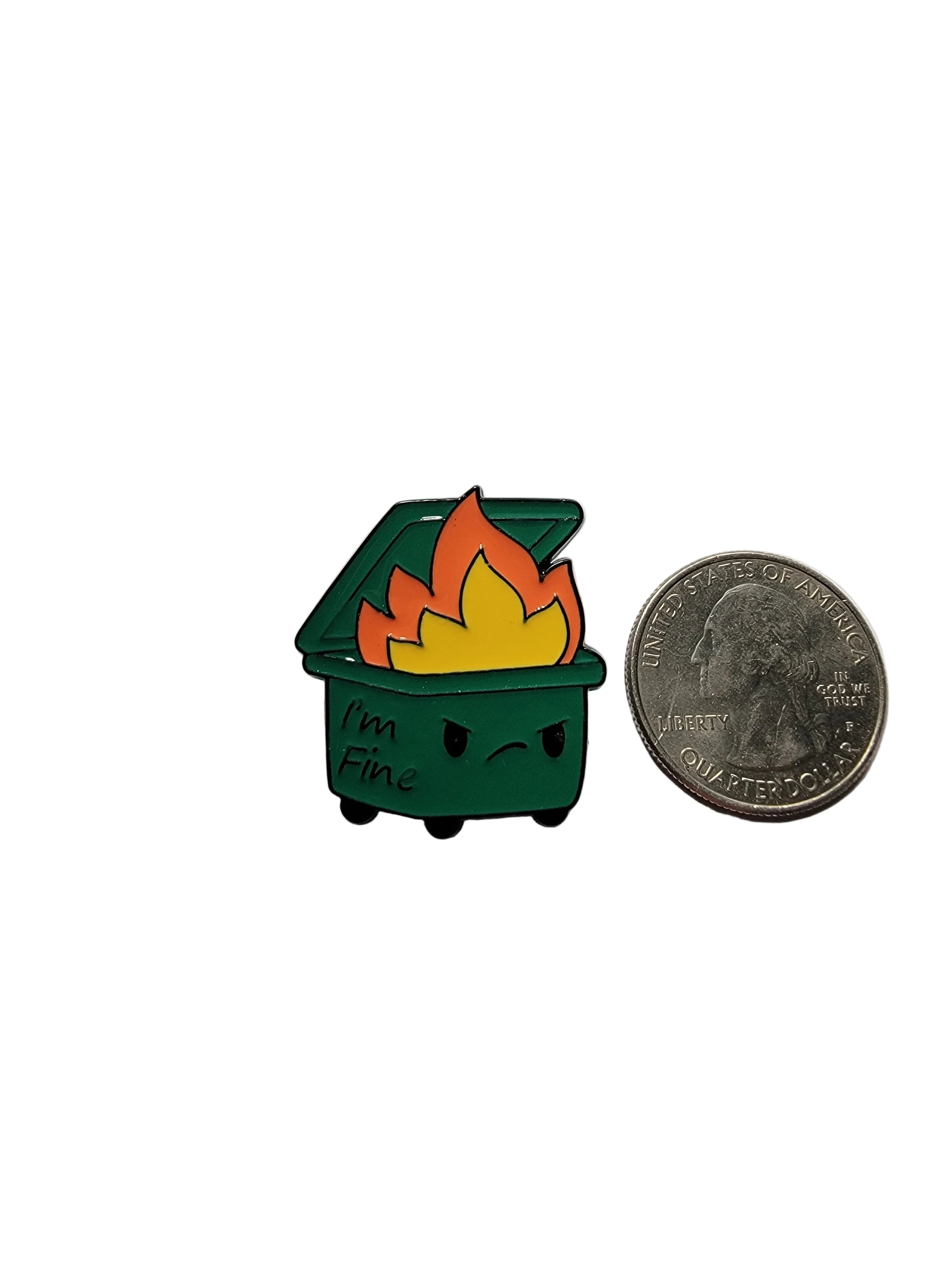 Small green and orange dumpster with a coin for scale on a white background