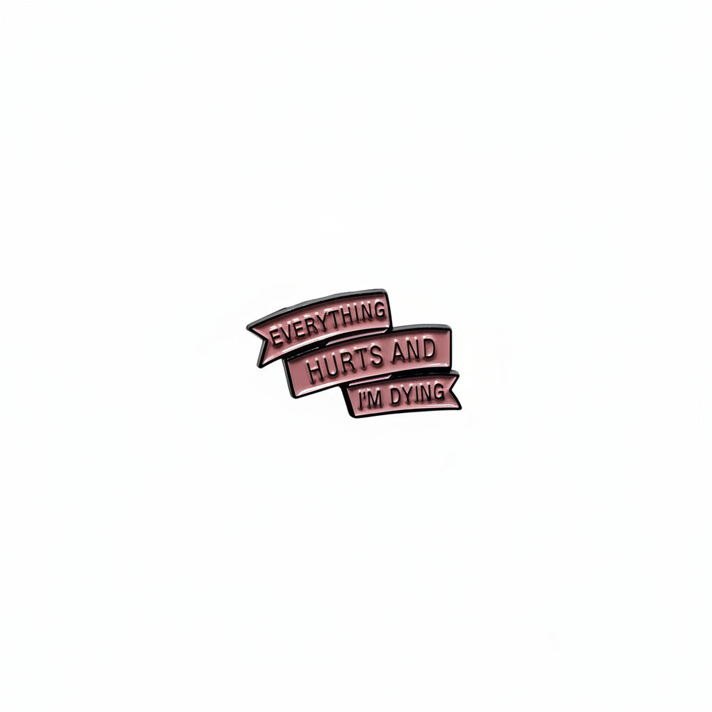 Everything hurts and I'm dying enamel pin featuring black text design, funy gift for jackets and bags