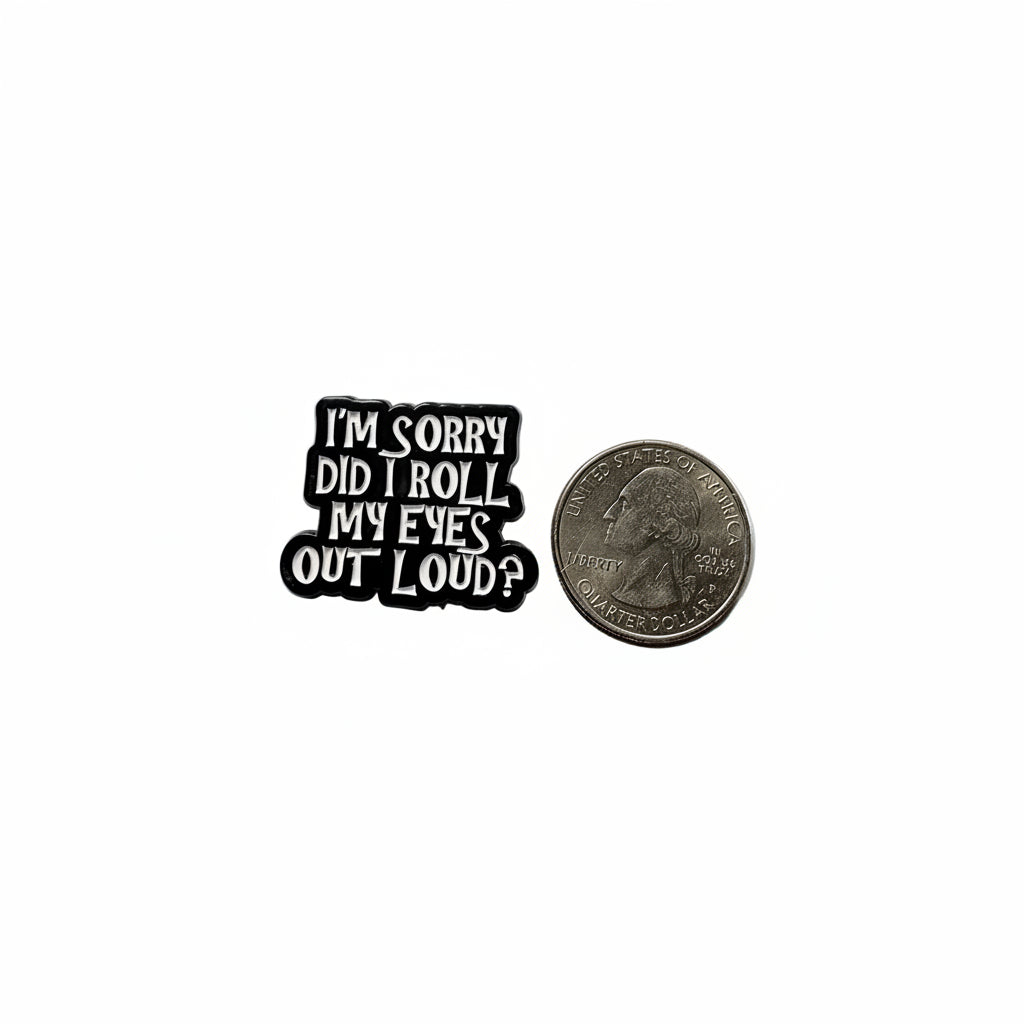 I'm sorry did I roll my eyes outloud enamel pin shown next to quarter for size reference sassy enamel pin dims  1 in W x 3/8 in H