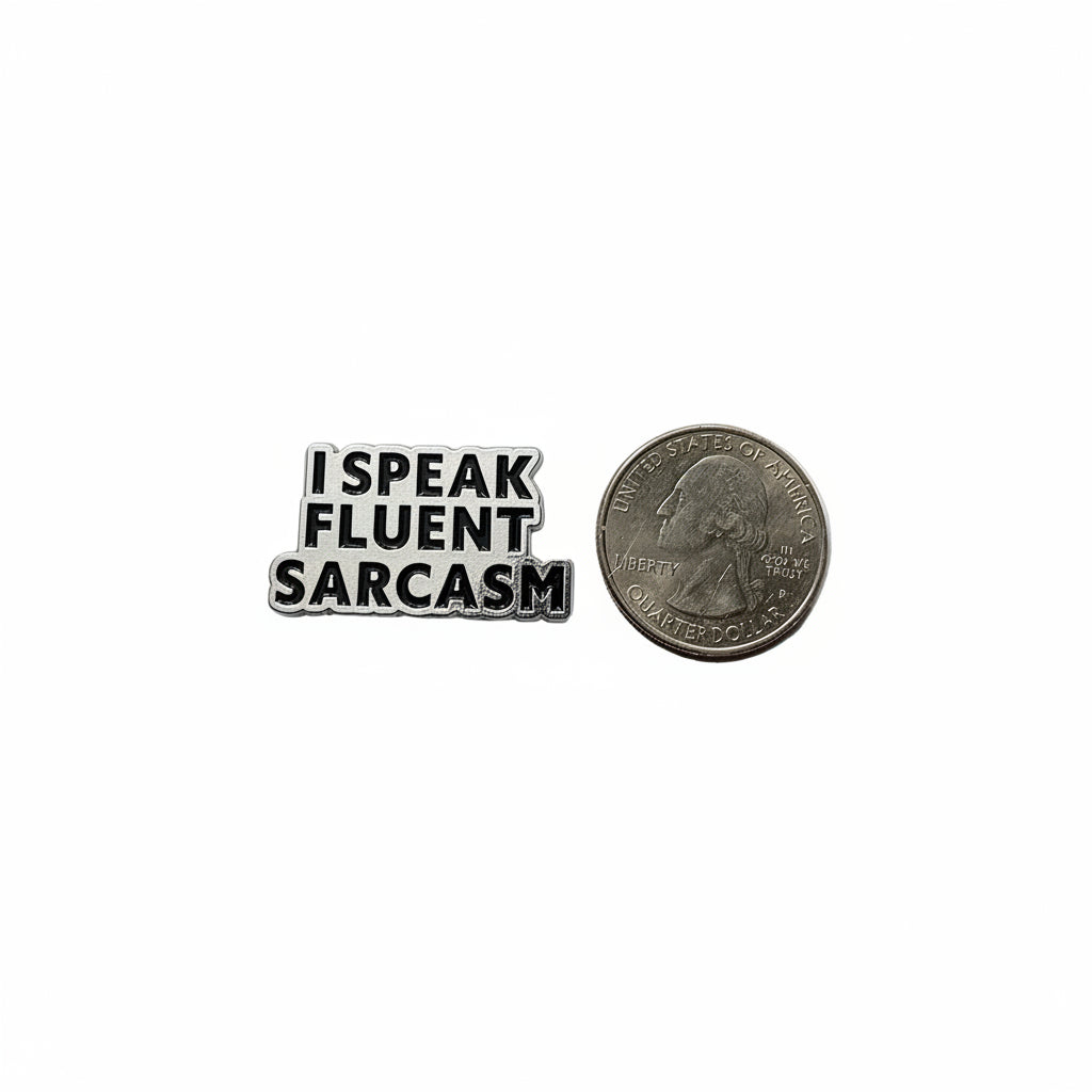 I speak fluent sarcasm metal badge shown next to quarter for size reference funny enamel pin dims 1 1/4 in W x 7 /8 in H