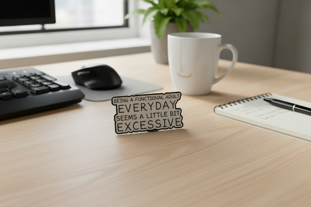 Metallic badge with text on a desk background