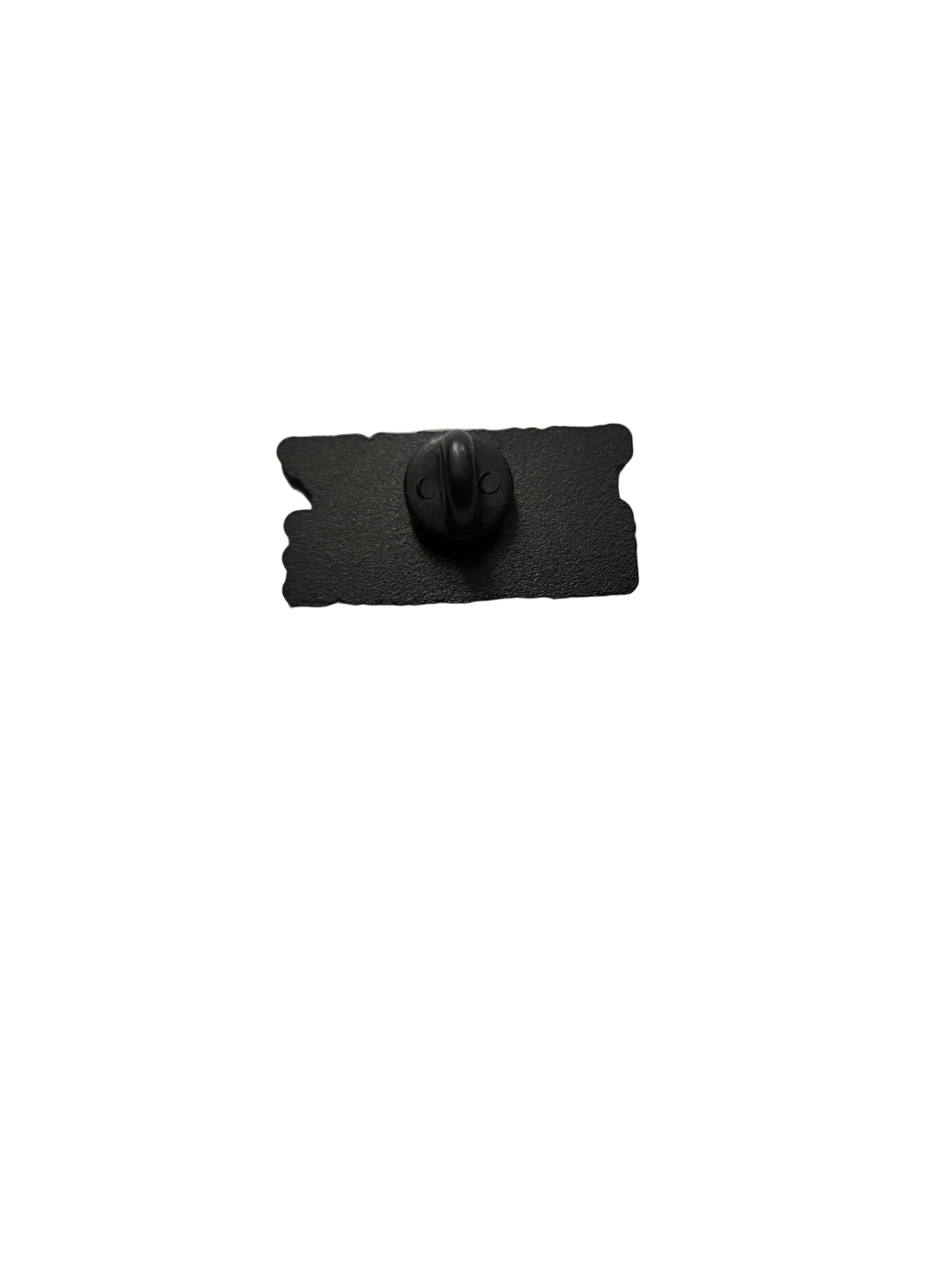 Black rectangular object with a central knob on a white background
