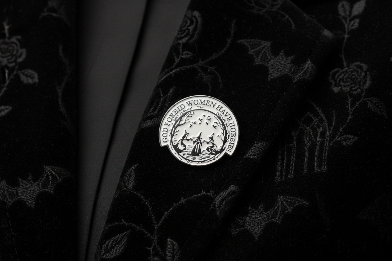 God forbid women have hobbies pin worn on jacket lapel, occult accessory style for gifting