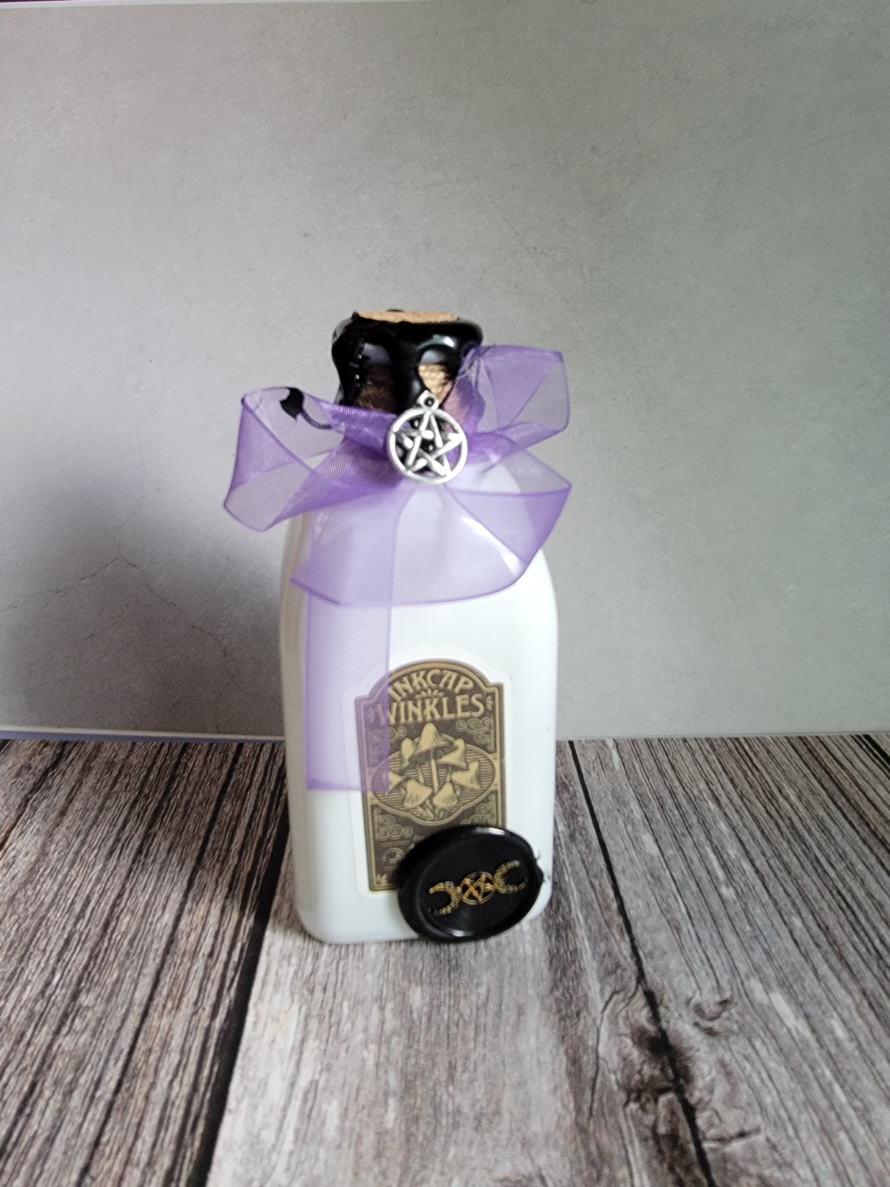 Halloween decor bottles perfect for goths, witches and anyone who enjoys witchy aesthetics. 
