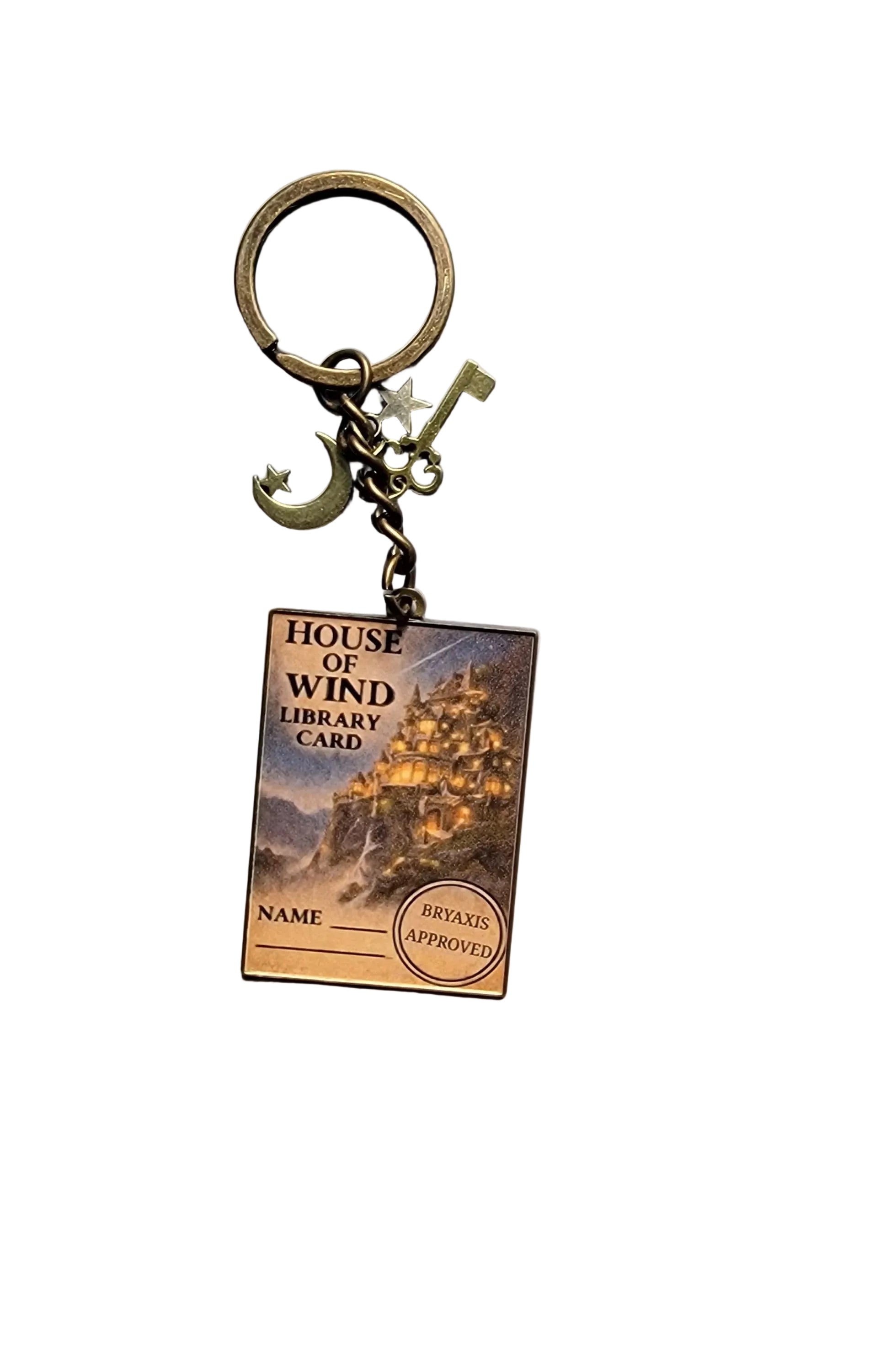 Keychain with a design resembling a library card on a gray surface