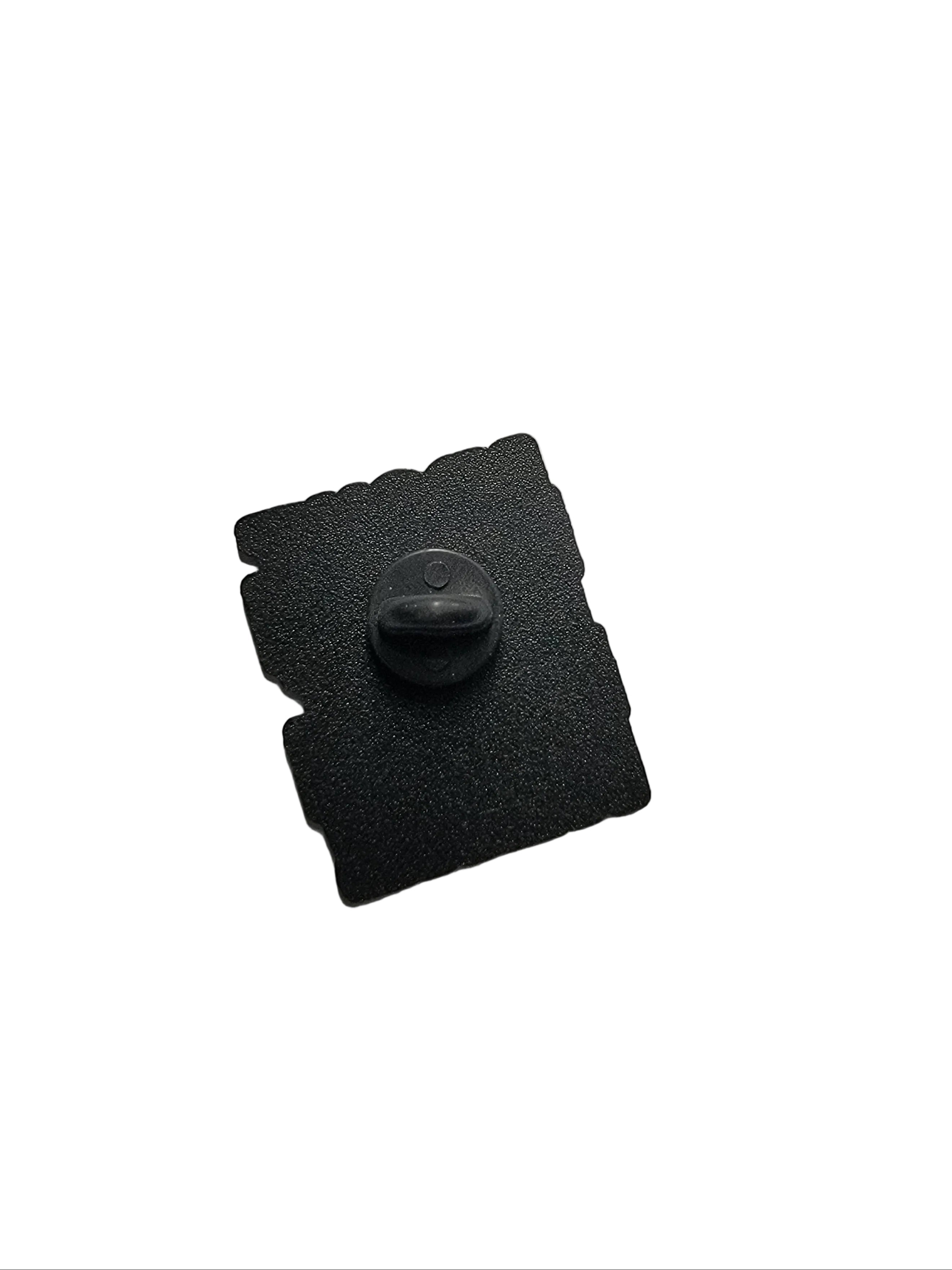 Black square patch with a central button on a light gray background