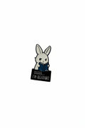 A cute bunny holding a book that says shhh i'm reading on a white background
