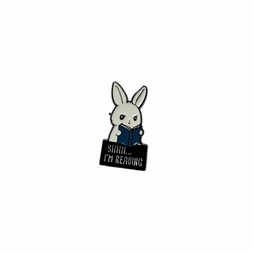 shhh i'm reading enamel pin featuring  bunny holding book design, reader gift for jackets and bags ex