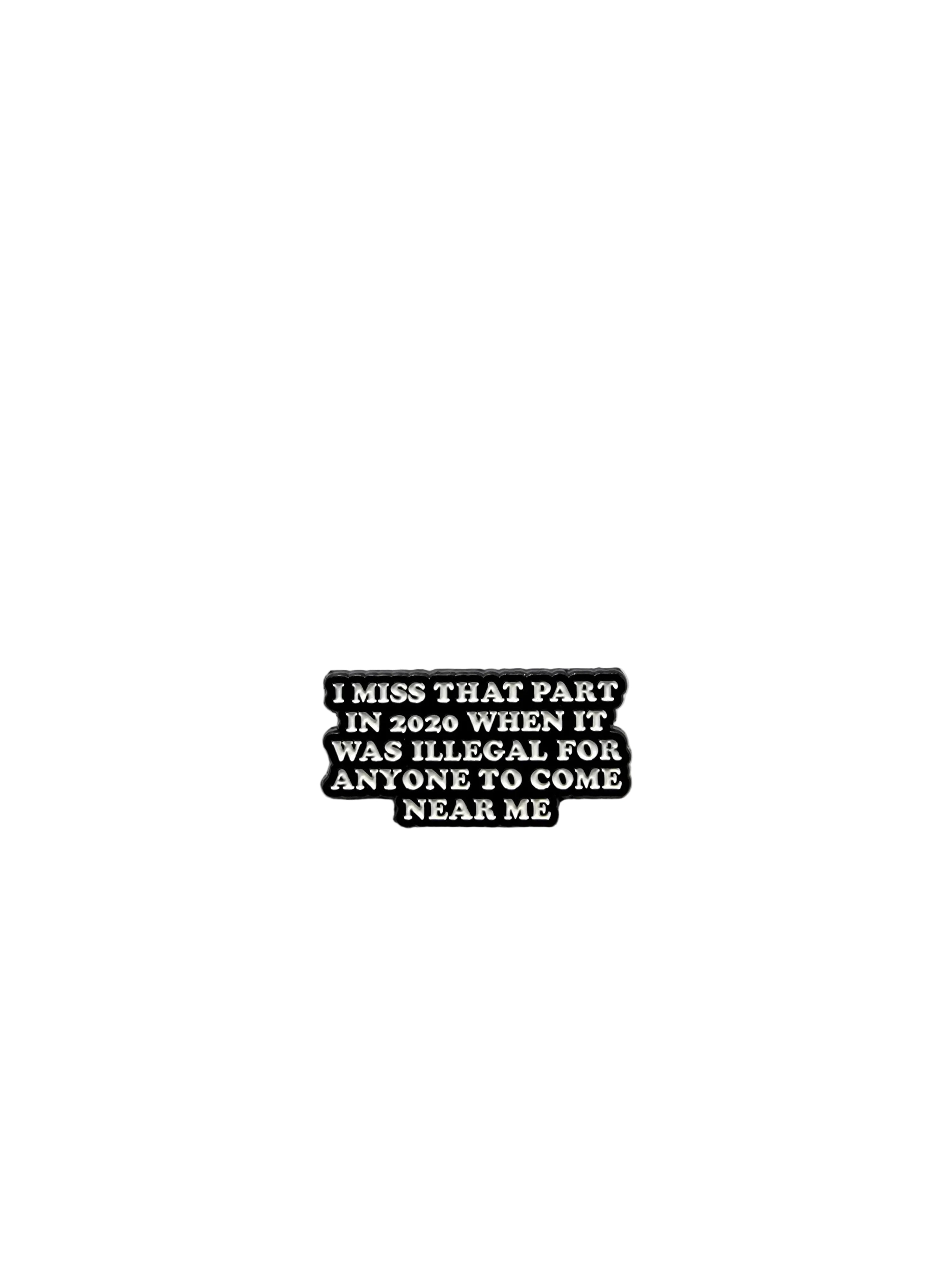 Black rectangular pin with white text on a gray background