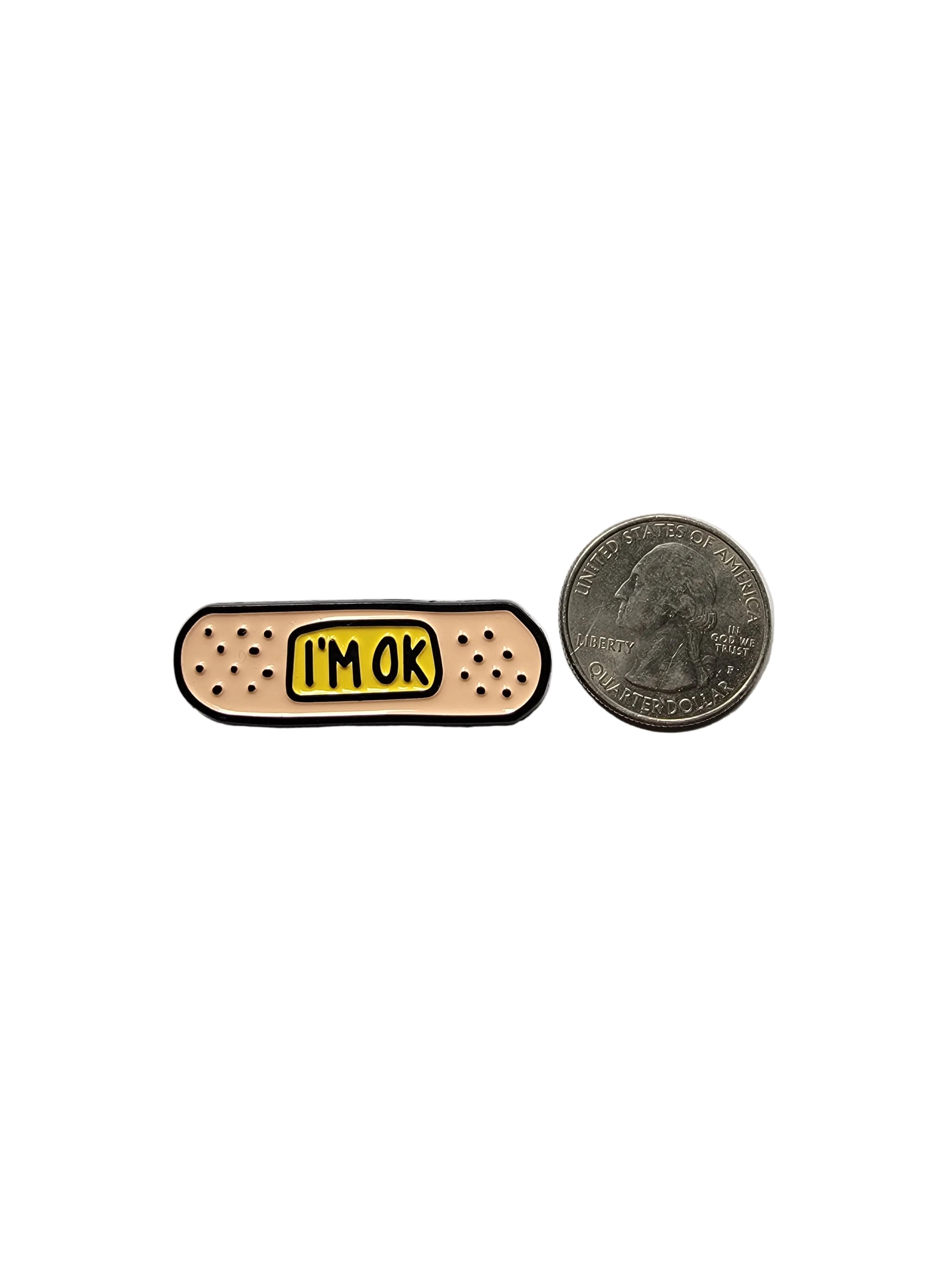 Small bandage with 'I'm ok' on a white background
