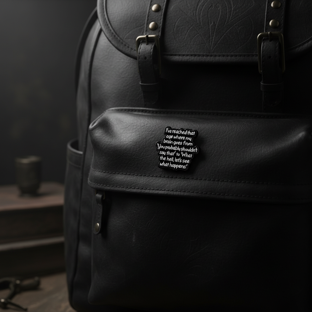 I've reached that age where my brain goes from "you probably shouldn't say that " to "what the hell let's see what happens" enamel pin on backpack sarcastic accessory for customizing bags and school gear