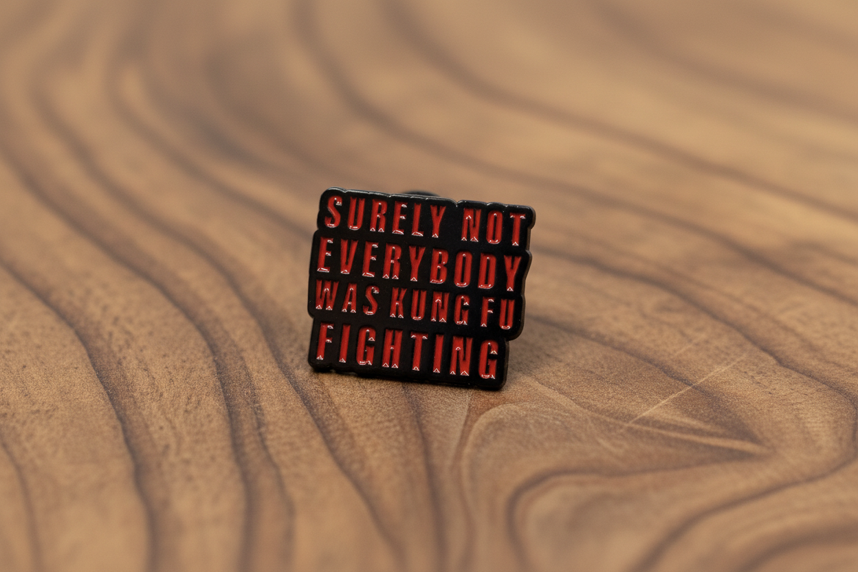 Small rectangular object with text on a wooden background