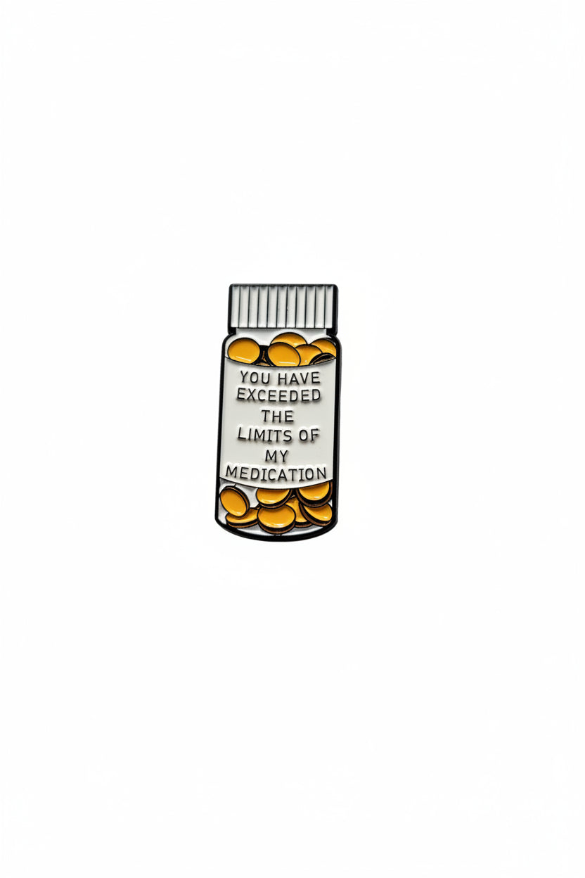 medicine bottle pin with text on a white background