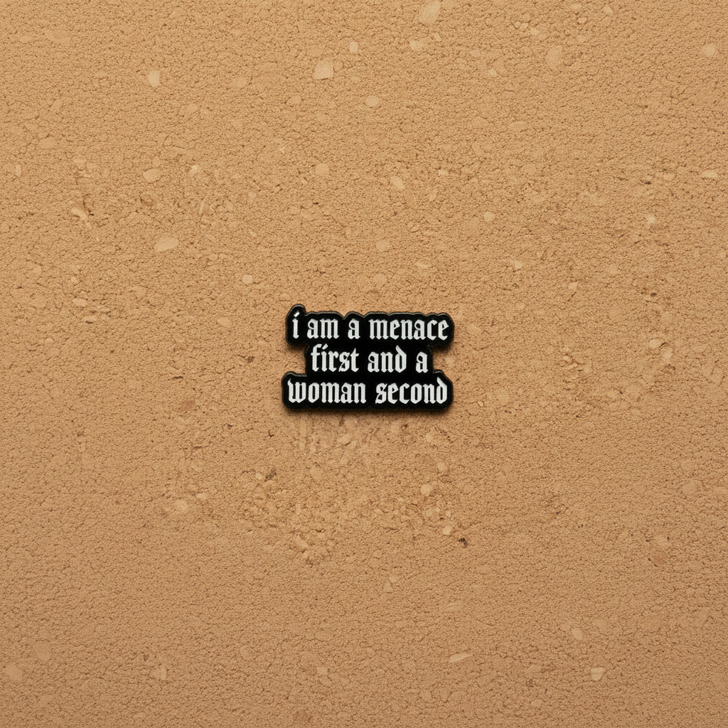 I am a menace first enamel pin displayed on cork board gen z enamel pin for collectors and display