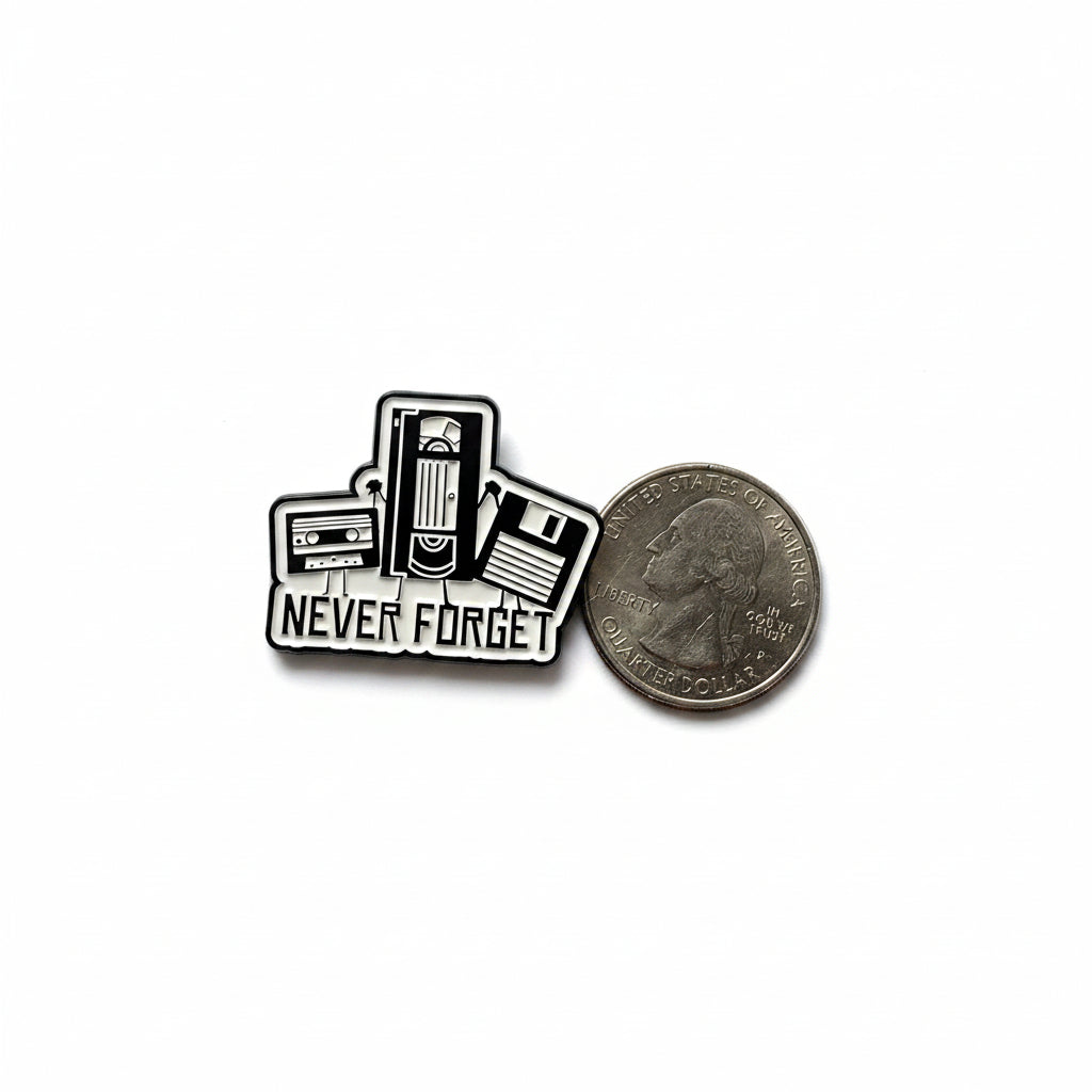 Never forget enamel pin hown next to quarter for size reference gen z enamel pin dims 1 1/8 in W x 1 in H