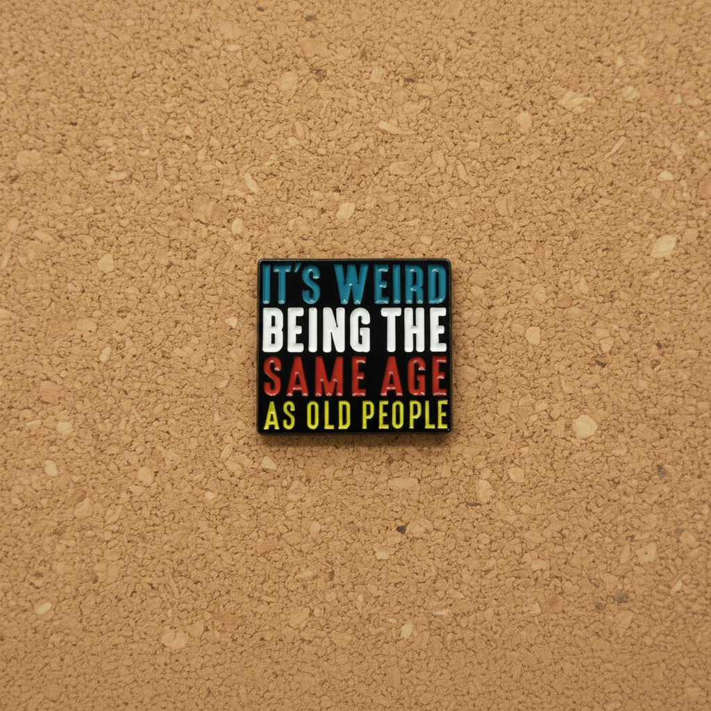 It's weird being the same age as old people enamel pin displayed on cork board hilarious enamel pin for collectors and display