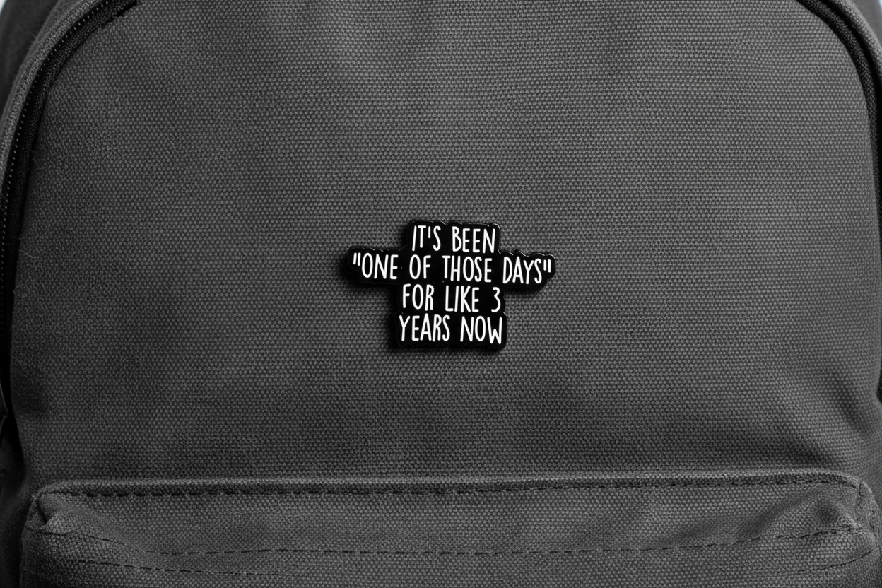 Black text on a gray bookbag background with a humorous quote.