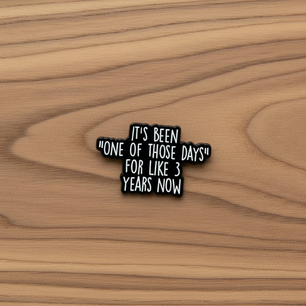 It's be none of those days for like 3 Years now enamel pin on wood background funny enamel pin with black and white text detail