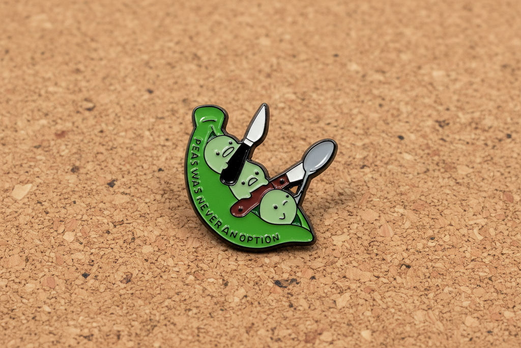 Green and white pin with text on a cork background