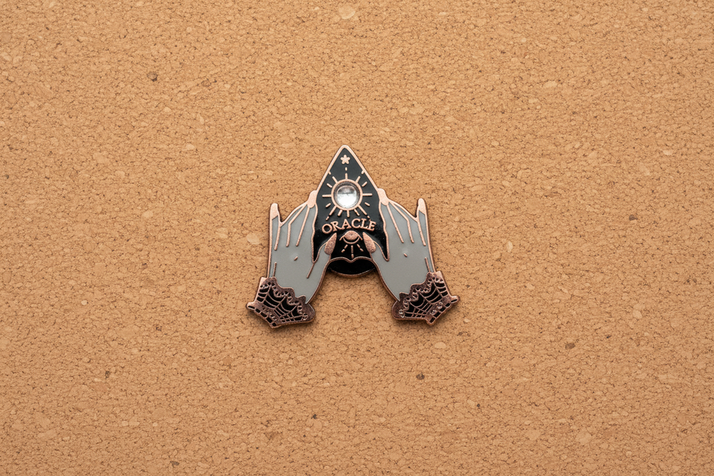 planchette enamel pin displayed on cork board witchy enamel pin for collectors and display