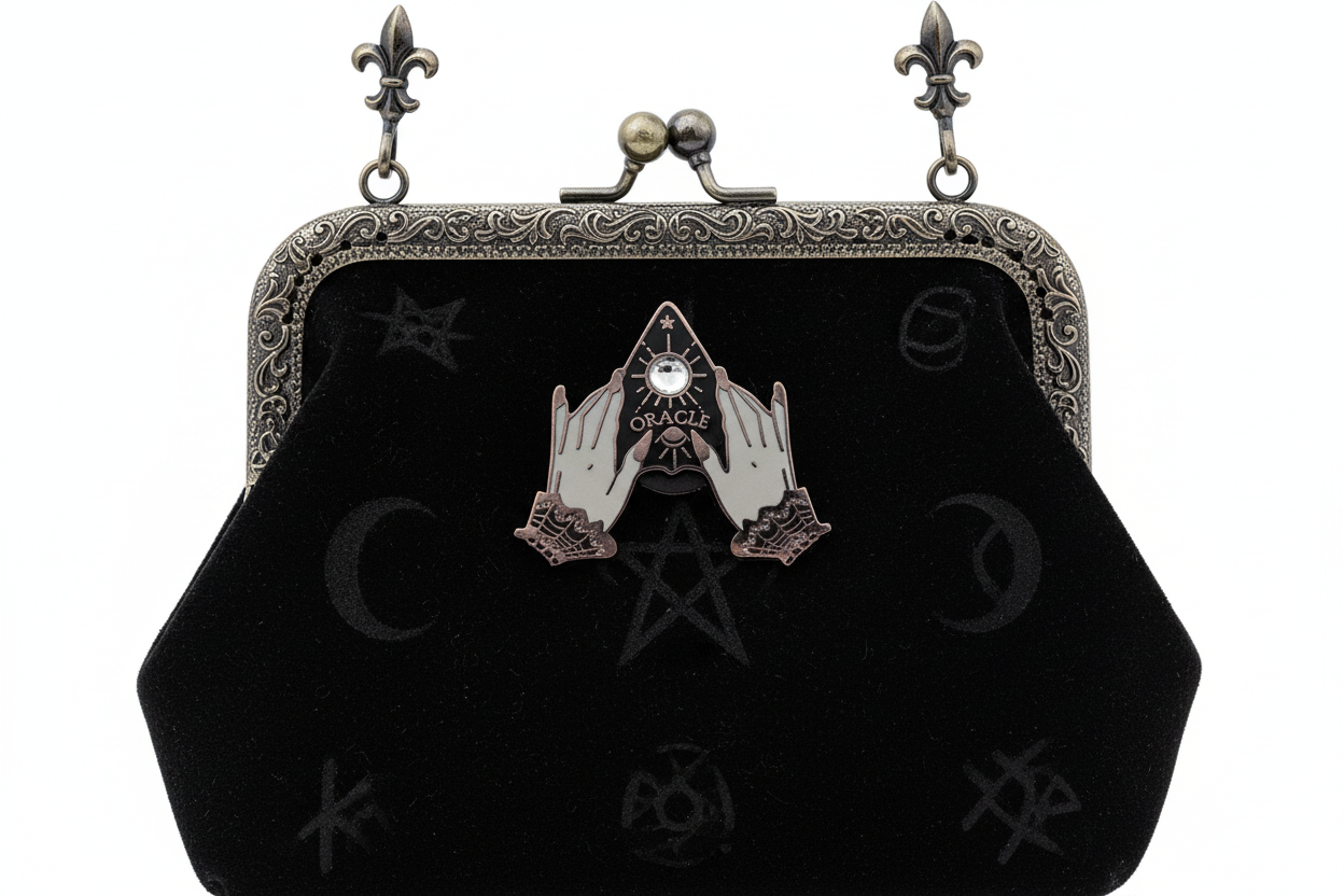 planchette enamel pin attached to purse witchy brooch accessory for bags and personal style