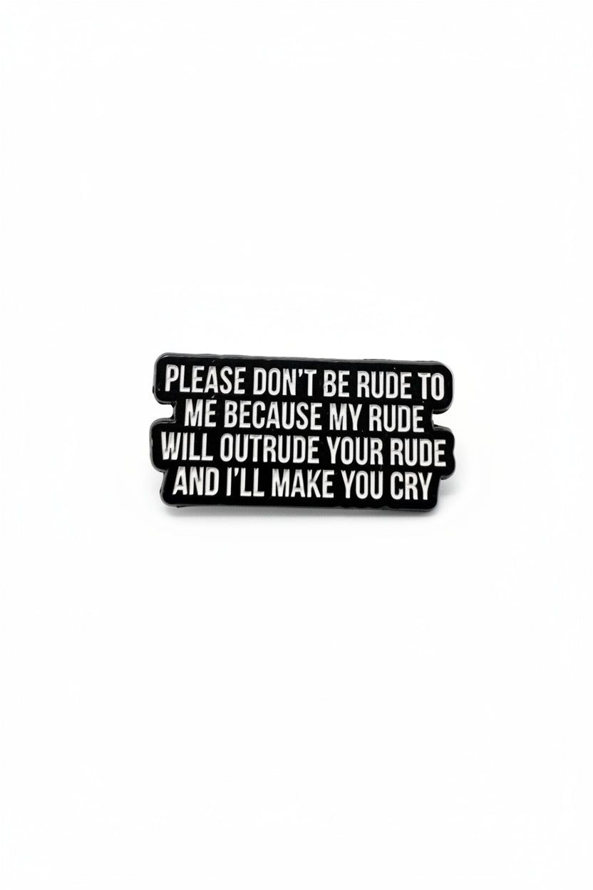 Black metal badge with white text on a gray background