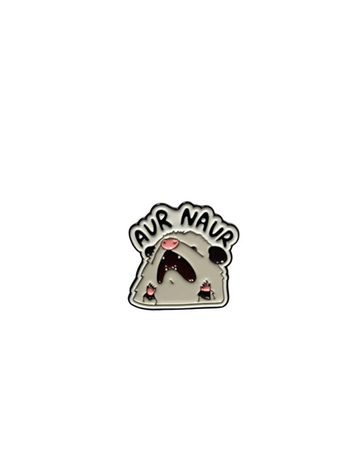 Small decorative item with text on a white background
