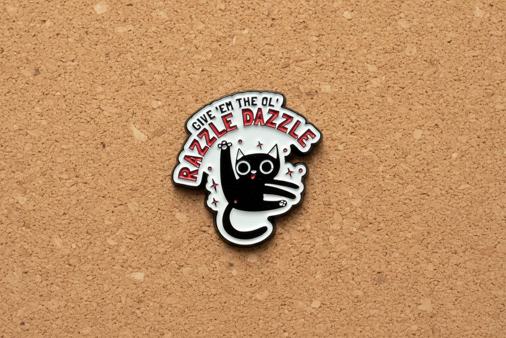 a white enamel pin with a cat and funny saying on a cork background