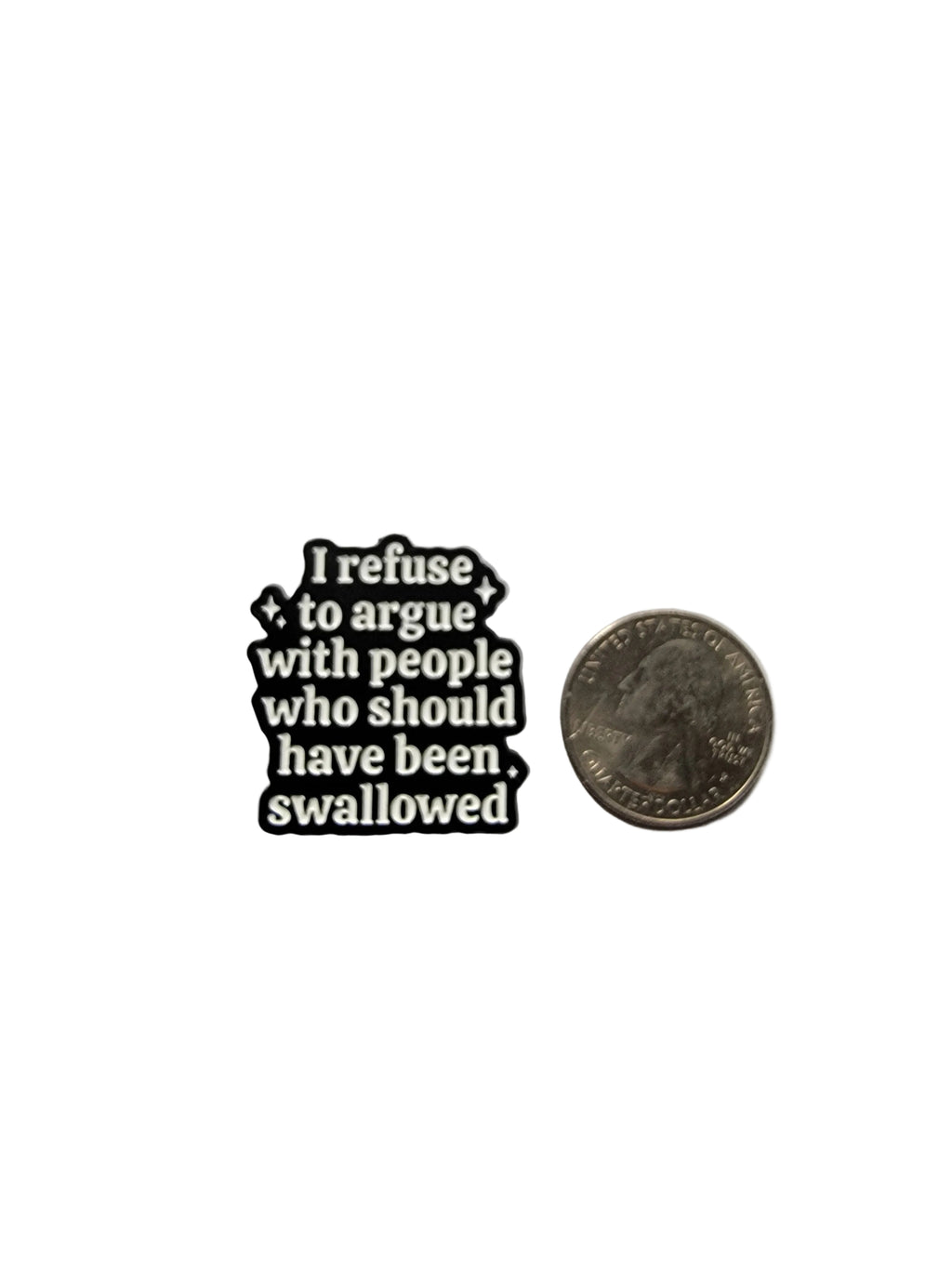 Small black and white sticker with text on a gray background