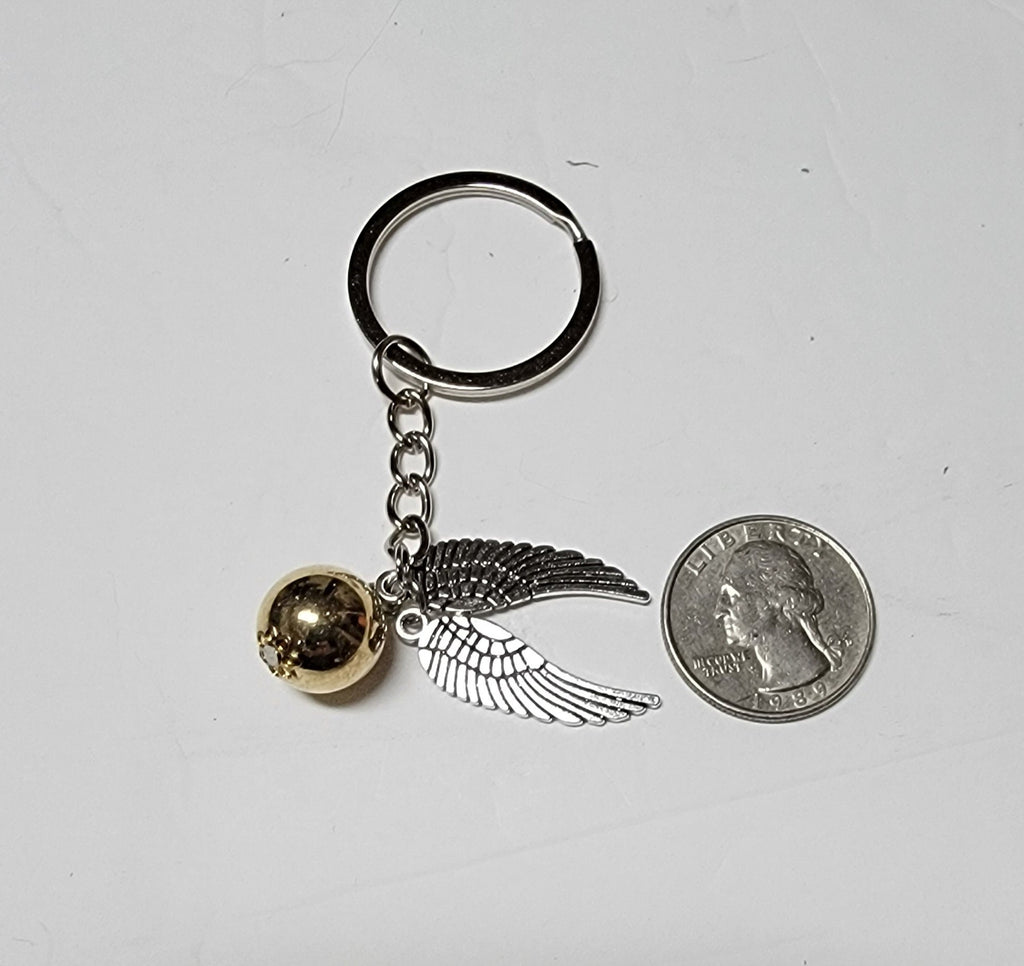 Magical Flying Ball Keychain – Gold & Silver Winged Charm, Wizard Sport Inspired, Fantasy Gift for Book Lovers