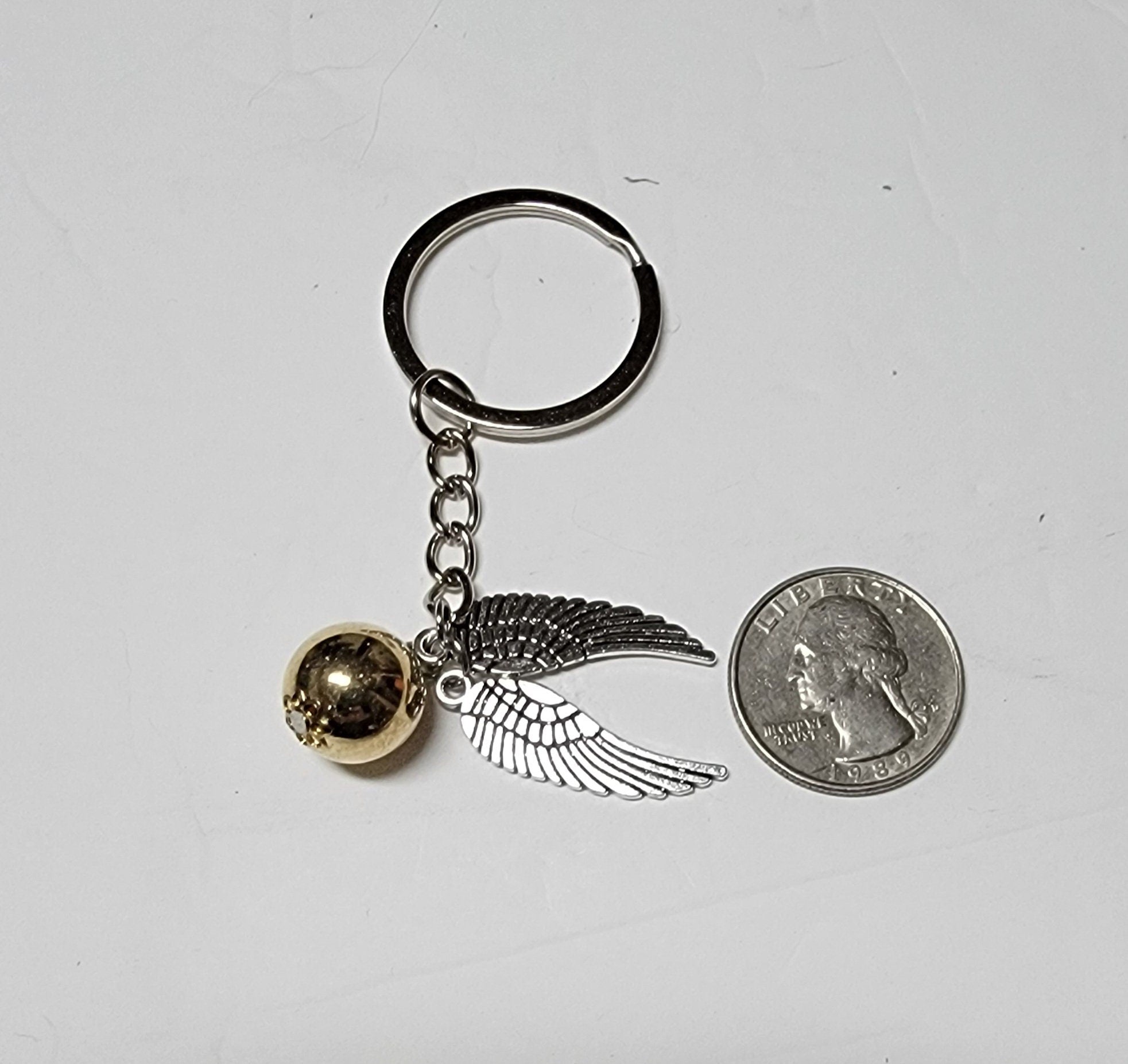 Magical Flying Ball Keychain – Gold & Silver Winged Charm, Wizard Sport Inspired, Fantasy Gift for Book Lovers