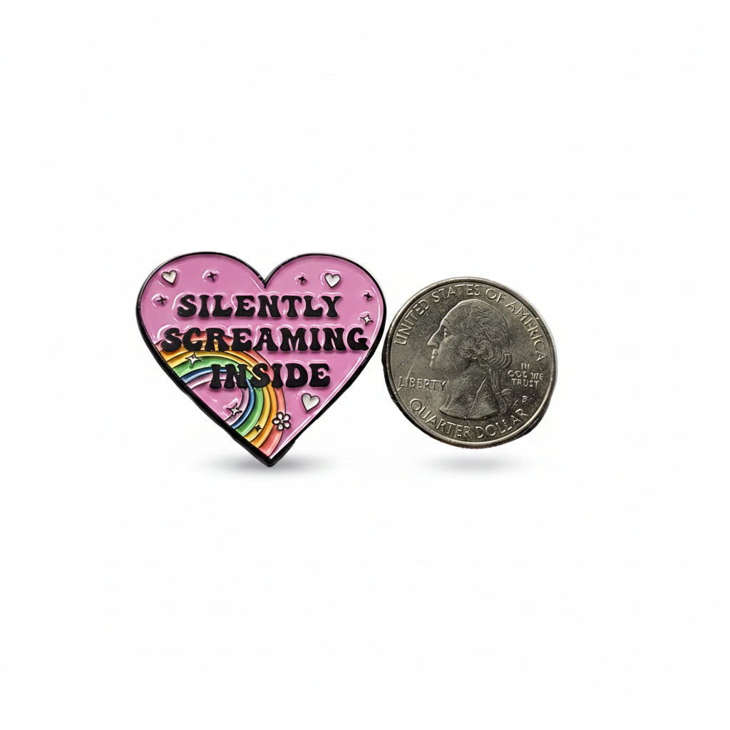 Silently Screaming Inside enamel Pin shown next to quarter for size reference funny enamel pin dims  1 1/4 in W x 1 1/4 in H