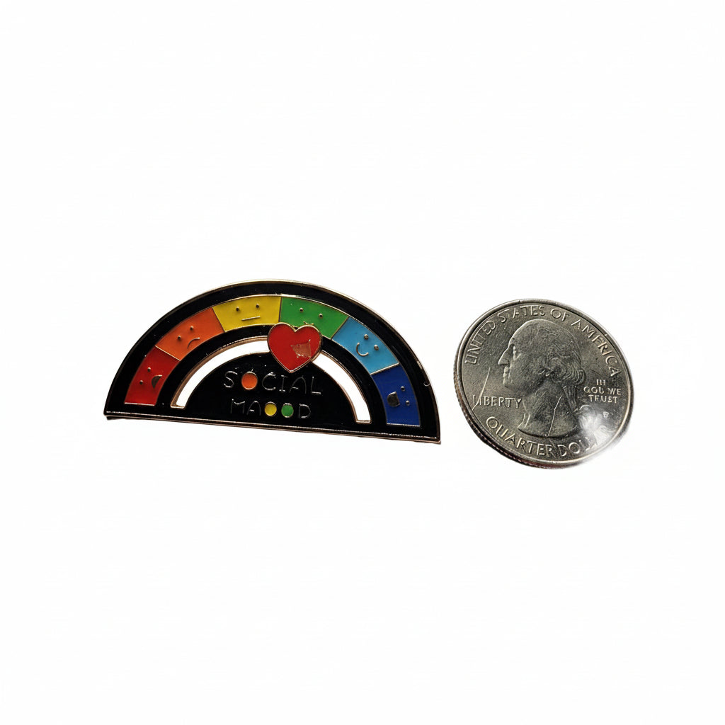 Social Mood enamel pin shown next to quarter for size reference funny enamel pin dims 1 1/2 in W x 1 1/2 in H