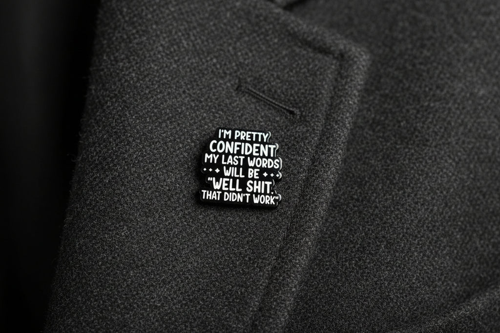 Black and white text badge on a gray background