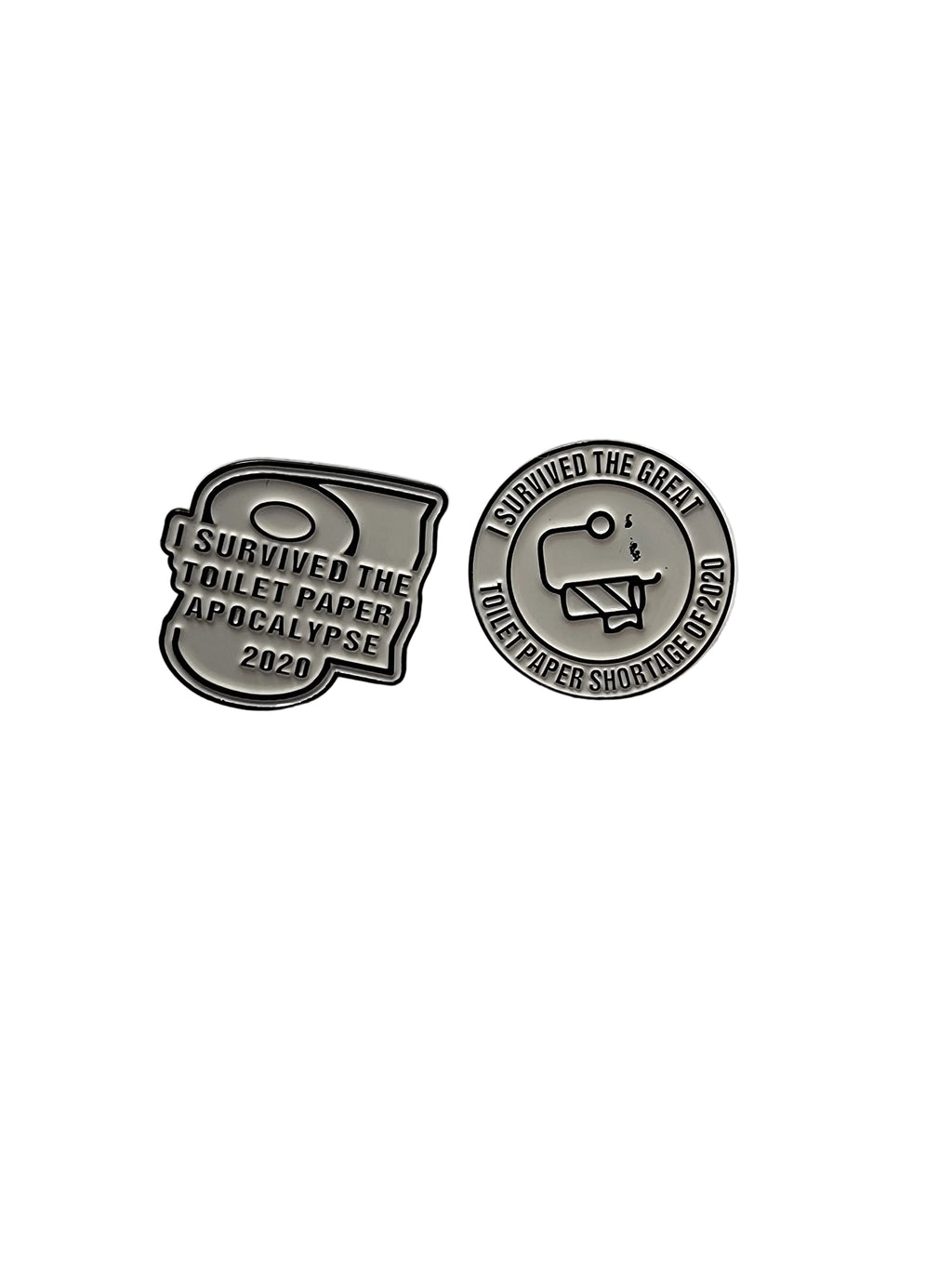 Two metallic pins on a light gray background