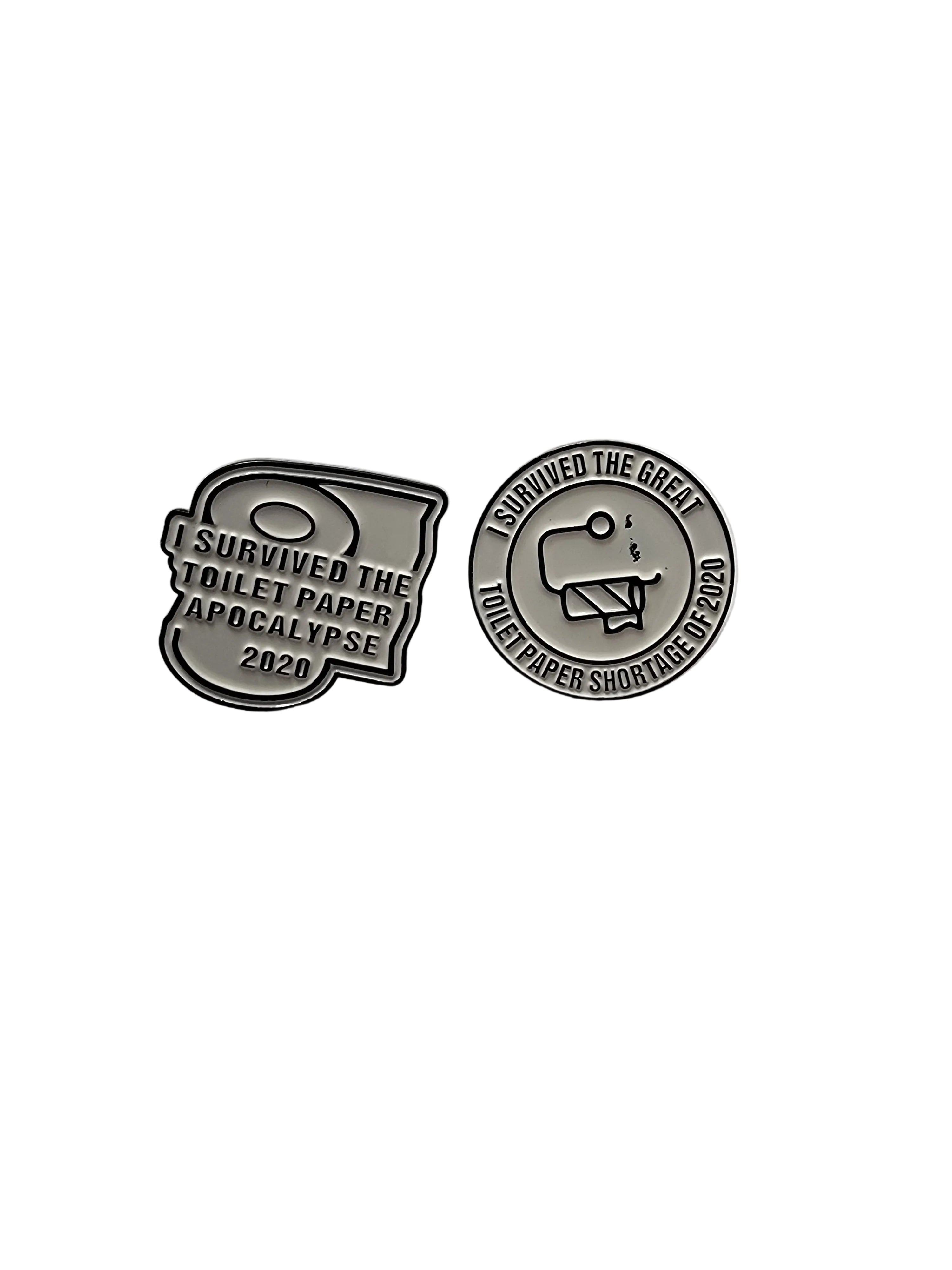 Two metallic pins on a light gray background