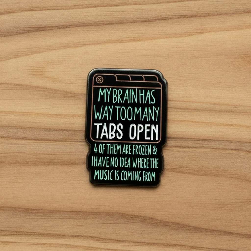 My brain has too many tabs open 4 of them are frozen & i have no idea where the music is coming from enamel pin on wood background sarcastic enamel pin with tab detail