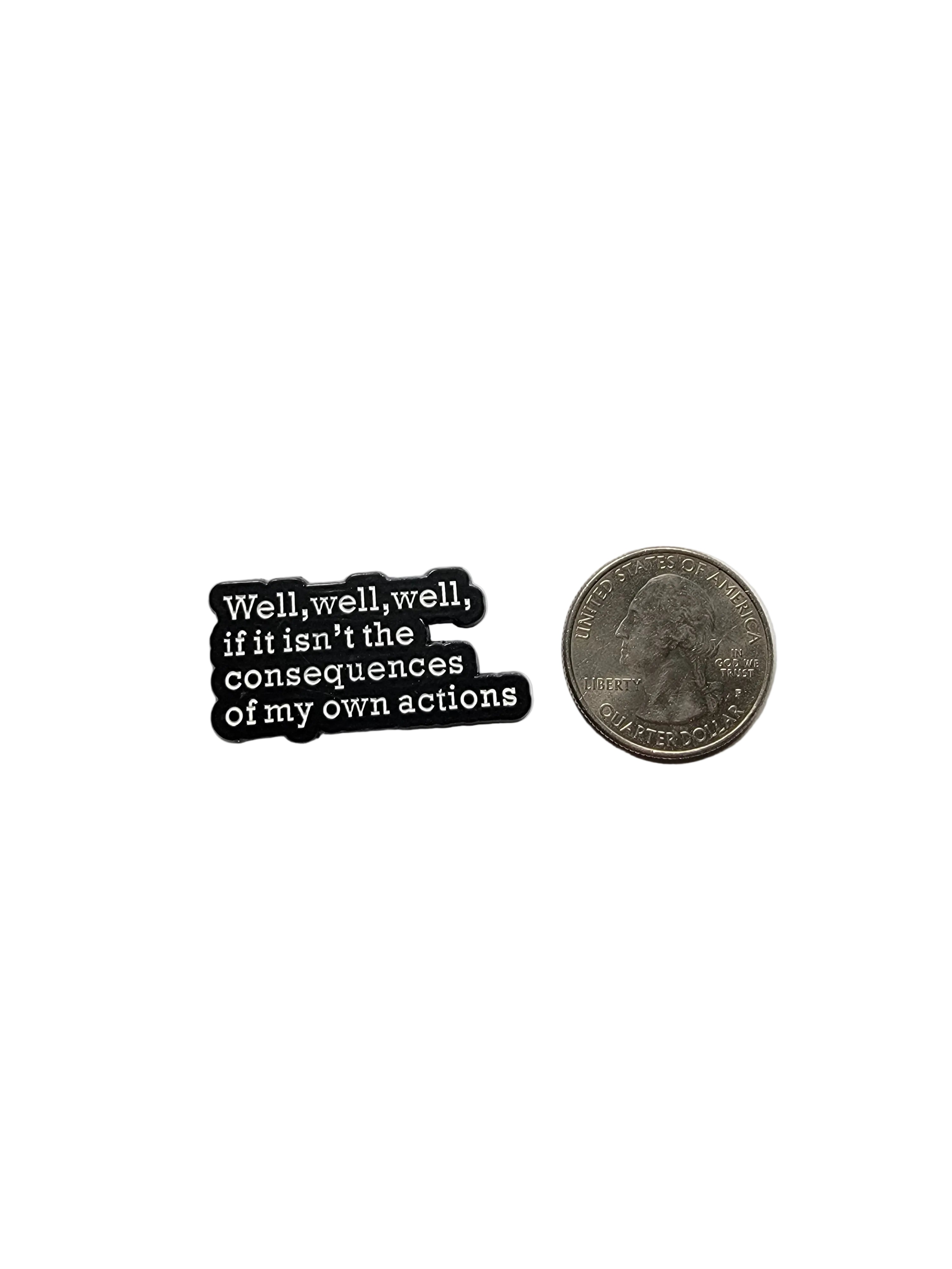 a black pin with white text on a white background