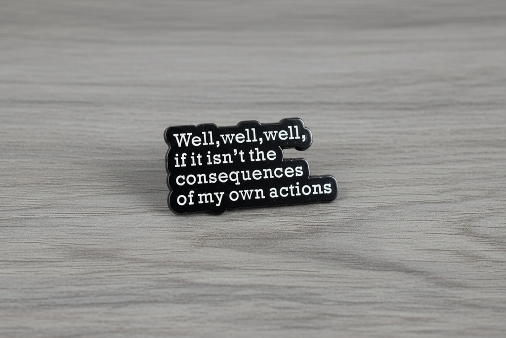 Black and white text pin on a wood background