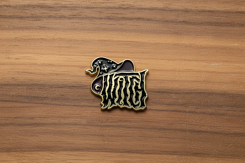 witch enamel pin on wood background Halloween enamel pin with witch hat detail