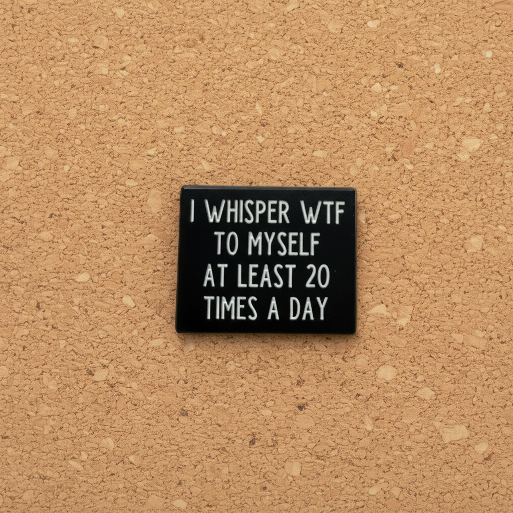 I whisper wtf to myself at least 20 times a day enamel pin displayed on cork board funny enamel pin for collectors and display